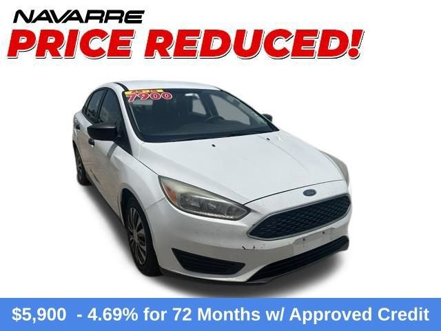 2017 Ford Focus S in White — front three-quarter view