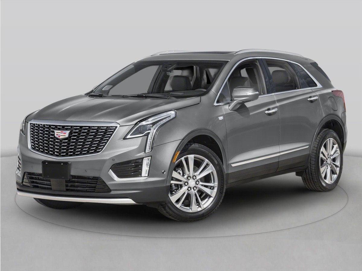2026 Cadillac XT5 Luxury in Crystal White Tricoat — front three-quarter view